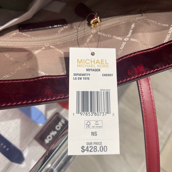 MICHAEL KORS Voyager Lg Metallic Logo Debossed EW Shoulder Tote Bag
Cherry 
NWT - Picture 15 of 16